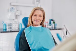 Older woman smiling at her dental checkup